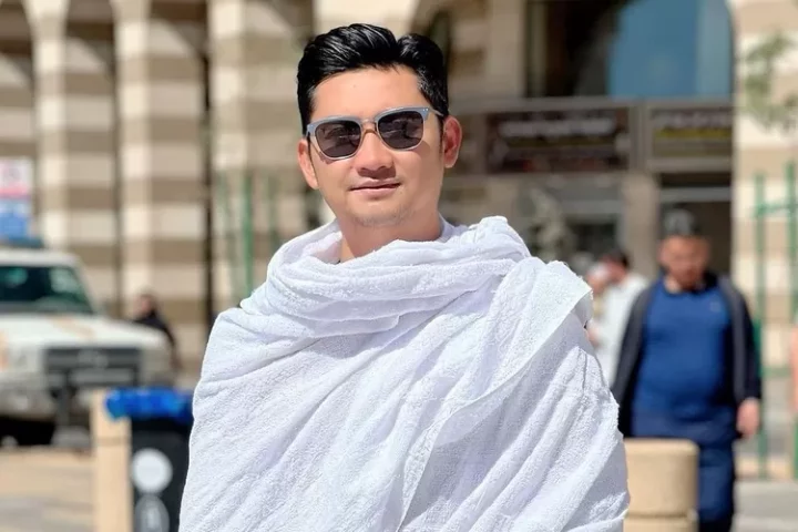 Dituduh Dewi Perssik pergi umrah pakai uang haram, reaksi adem Angga Wijaya dipuji netizen: Insya Allah...